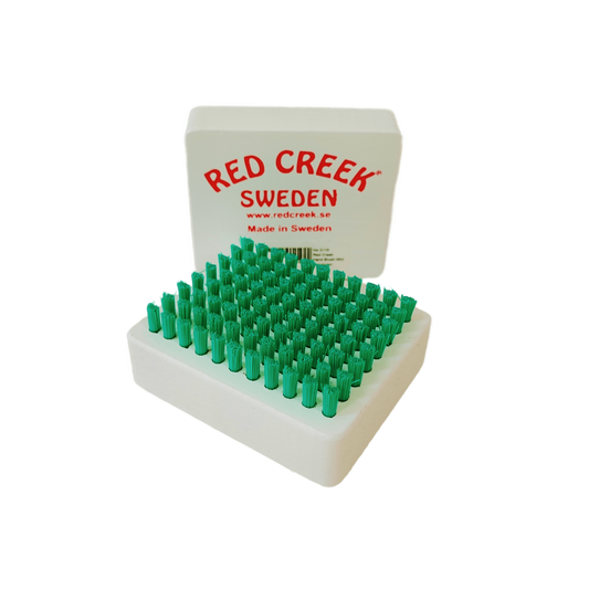 A product picture of the Red Creek Green Nylon Mini Hand Brush