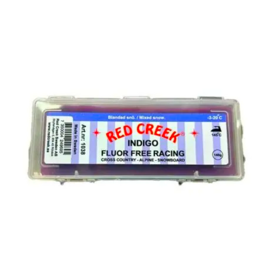 A product picture of the Red Creek Fluoro-Free Indigo Mixed Snow Hard Melt Glide Wax (-3C/-20C) | 140g