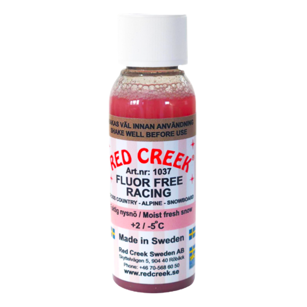 A product picture of the Red Creek Fluoro-Free Racing Pink Wet and New Snow Liquid Glide Wax (2C/-5C) | 90ml