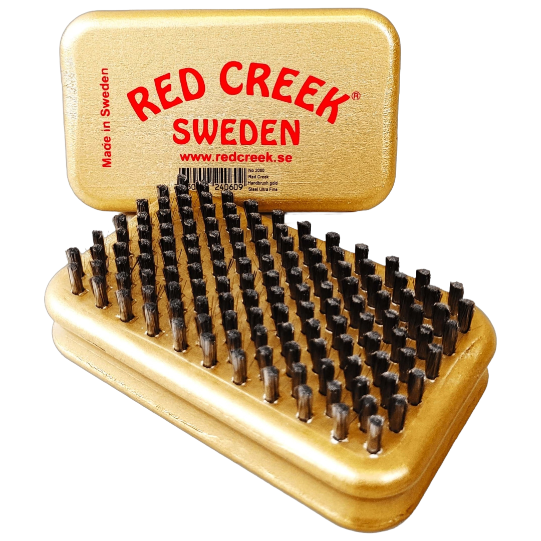A product picture of the Red Creek Ultrafine Straight Steel Gold Hand Brush