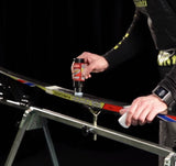 Liquid kick wax application