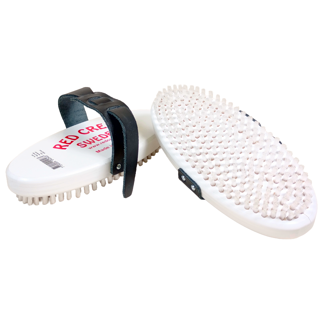 A product picture of the Red Creek Hard White 6mm Nylon Oval Hand Brush