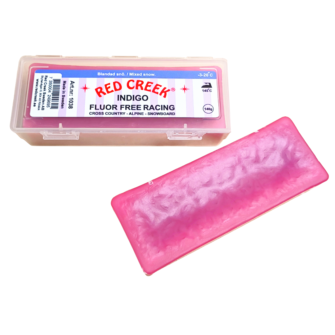 A product picture of the Red Creek Fluoro-Free Indigo Mixed Snow Hard Melt Glide Wax (-3C/-20C) | 140g