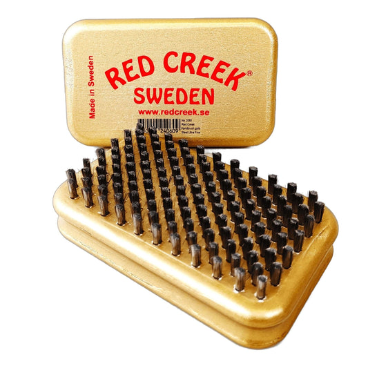 A product picture of the Red Creek Ultrafine Straight Steel Gold Hand Brush