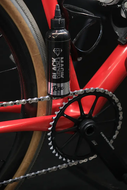 A product picture of the Rex Wax Black Magik Chain Drip Wax | 180ml